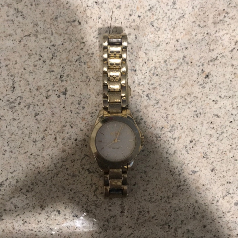 Gold coach watch